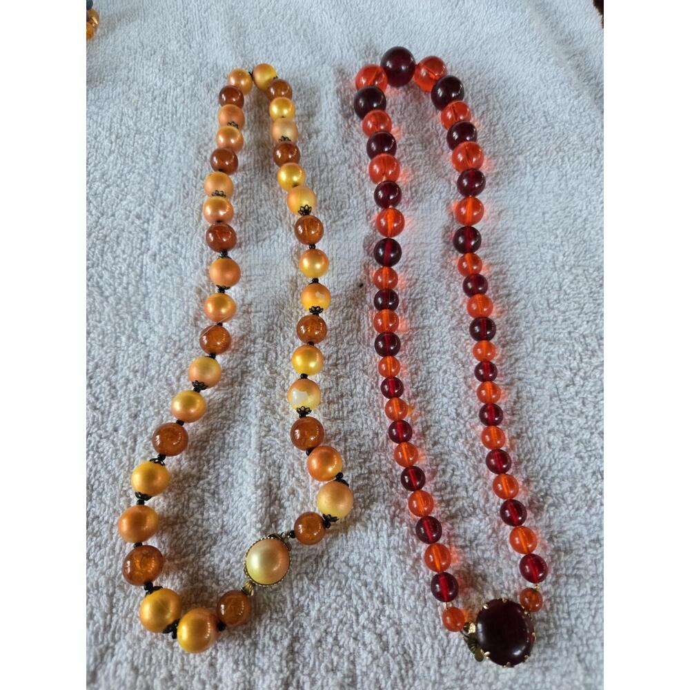 Two Beaded Necklaces. One Says Hong Kong Another Says West Germany